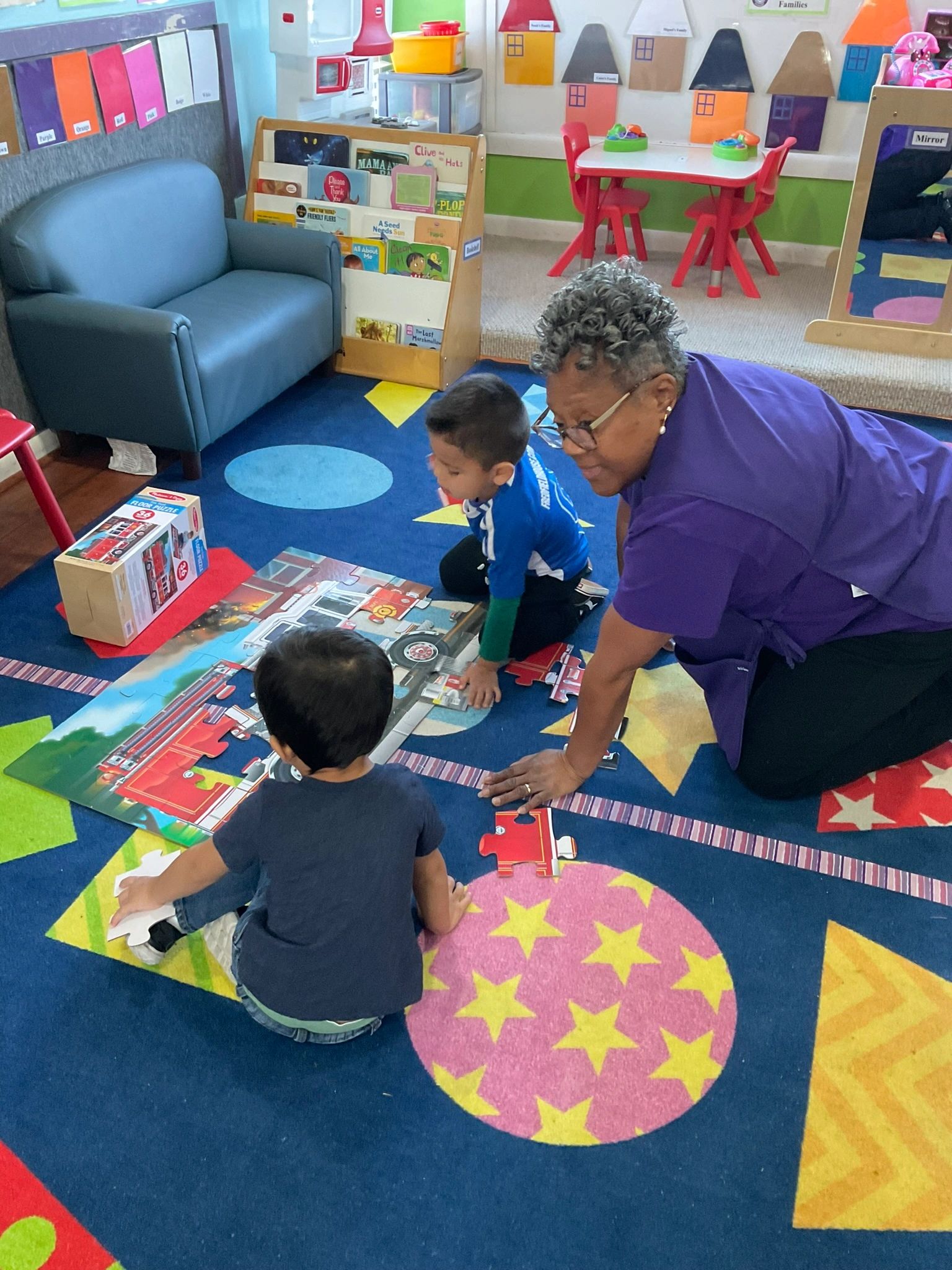 Children reading books in classroom
