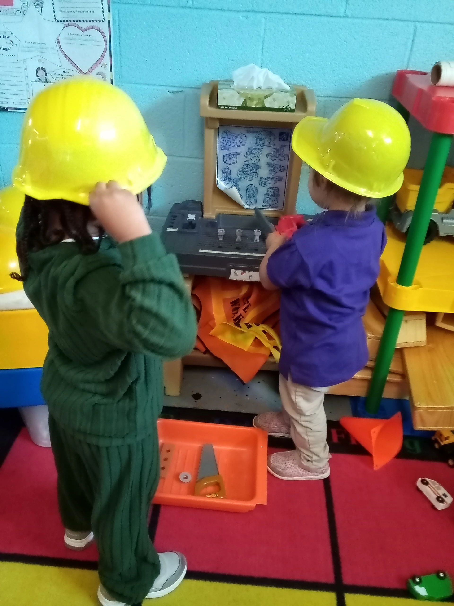 Children in construction play activity